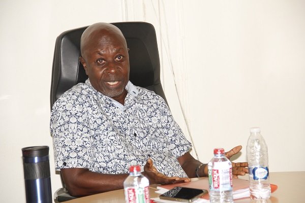 Mr Kersi (inset) addressing the meeting