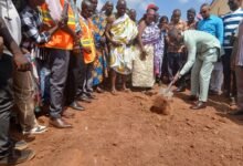 Mr Vincent Antwi Agyei (with a shovel) performing sod cutting ceremony