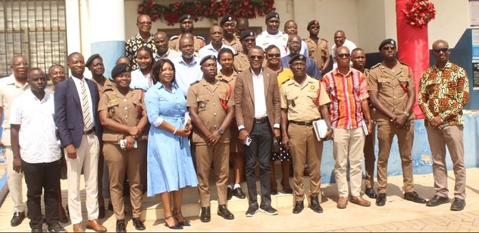 • Mr Fancis Lamptey (fifth from right,front row) and DOII Marsell K. Avadu (fifth from left) with both staff of GWCL and GNFS after the engagement Photo: Ebo Gorman