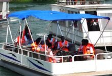 Some tourists cruising on the lake