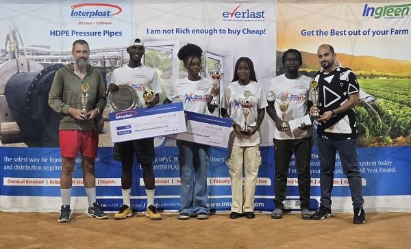 • The winners-Acquah, Tomegah and runner-ups, Ampah and Okantey with their prizes. With them are Connor Baker (left) and an official of Interplast