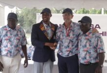 • Torgah (in the winner's jacket) flanked by PGA executives - Ahmed Padori (left) and Hans De Beer