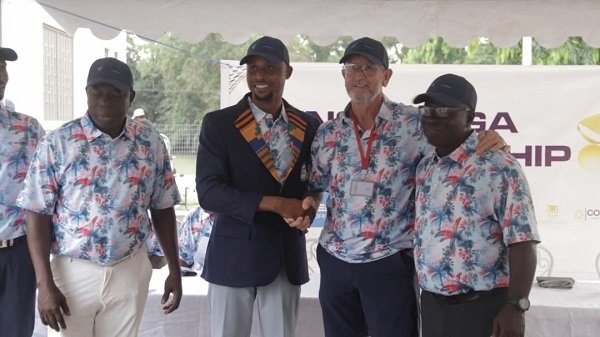 • Torgah (in the winner's jacket) flanked by PGA executives - Ahmed Padori (left) and Hans De Beer