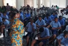 • Mrs Thywill Eyra Kpe (infront) addressing the students