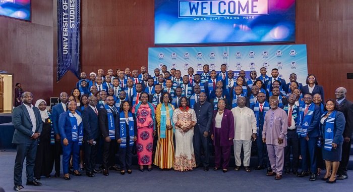 Mrs Ernestina Appiah (in Kente cloth, front row) with the dignitaries and the graduands after the graduation ceremony