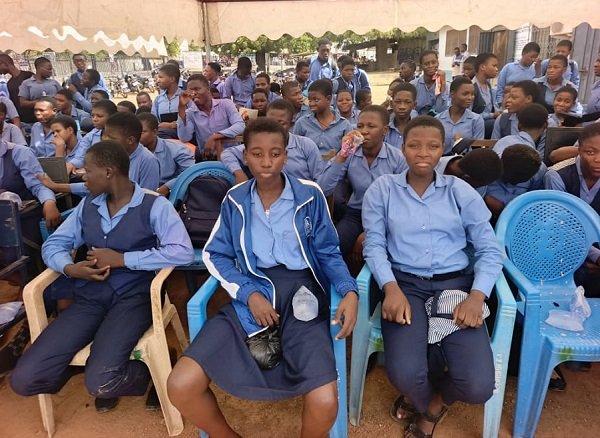 Roland Atanga Ayoo (4th from left), other dignitaries seated at the World AIDS Day