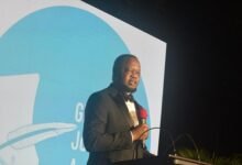 Dr Justice Srem-Sai (inset) addressing the gathering)