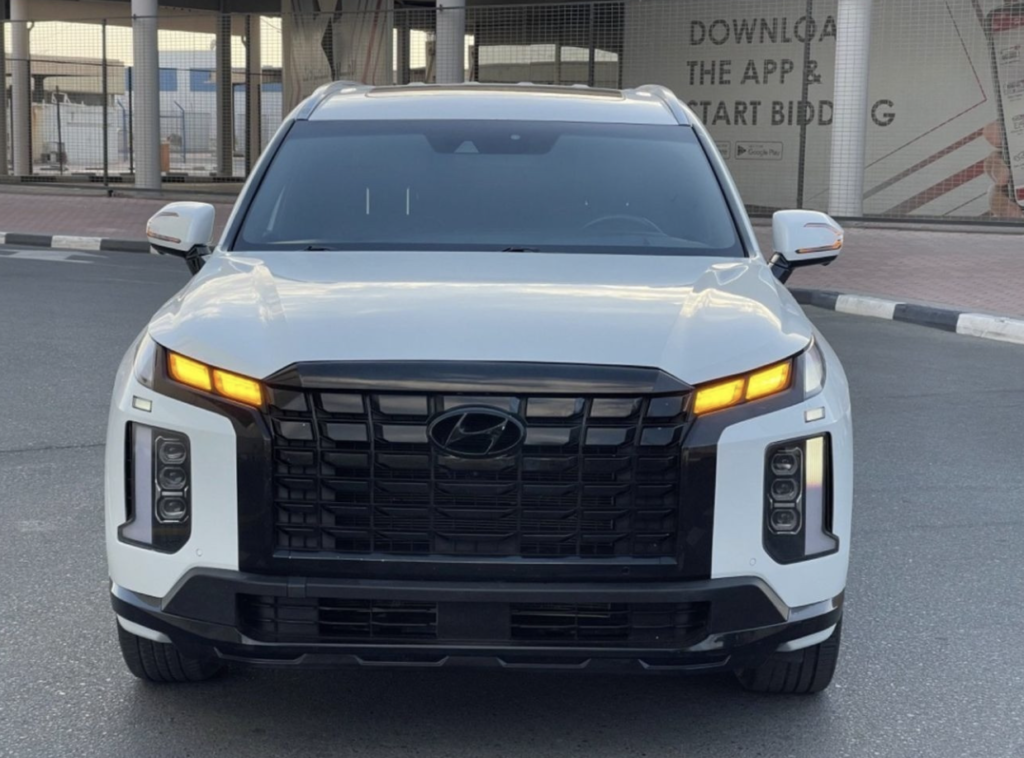 Monthly car rent Dubai option showing a customer driving a modern