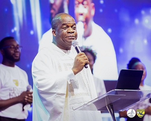 • Rev. Stephen Wengam (inset) addressing the congregation at the Watch Night Service