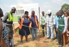 Ms Nongo cutting sod for works to begin 2