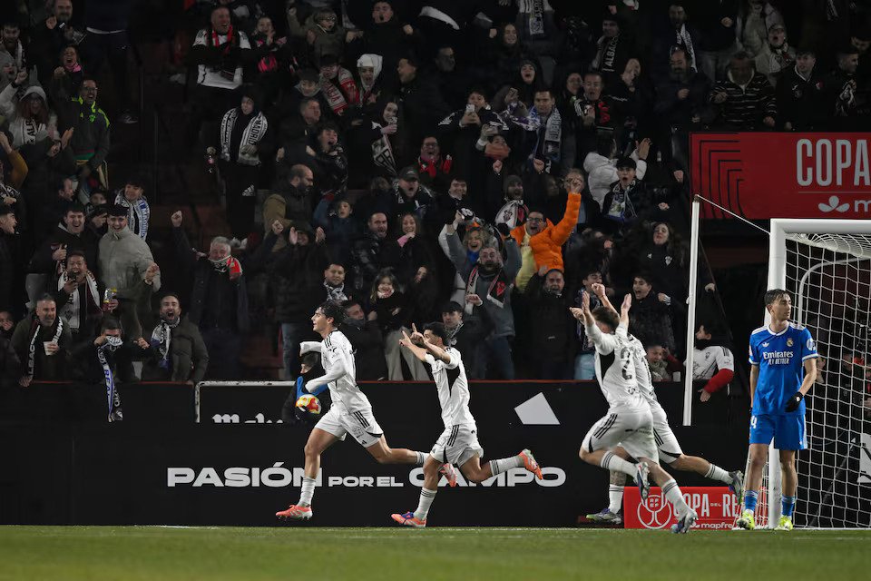 Albacete's Javi Villar celebrates scoring their first goal with teammates