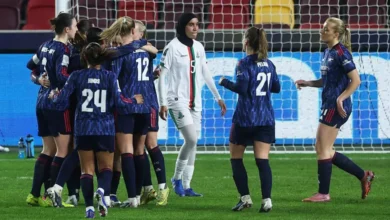 Arsenal players celebrating a goal during the game