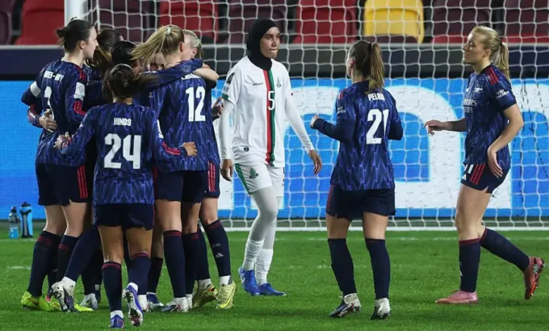 Arsenal players celebrating a goal during the game