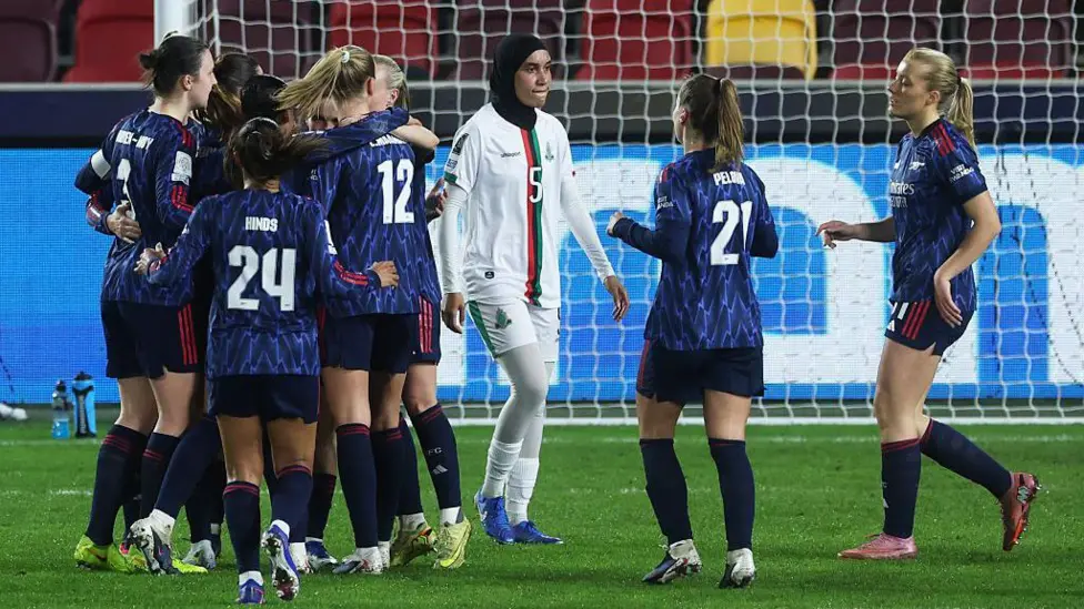 Arsenal players celebrating a goal during the game