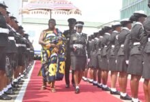 Otumfuo Osei Tutu II (left) inspecting all female guard of honour Photo Victor A. Buxton