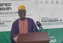 • Mr Ismail Adam addressing participants during the summit