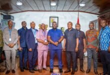 -Dr Amoakohene (middle) with ECG managers