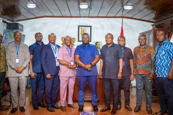 -Dr Amoakohene (middle) with ECG managers