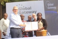 Ambassador Rune Skinnebach (left) and Mrs Stella Akosua Ansah showing the signed MoU at the launch; Photo; Ebo Gorman