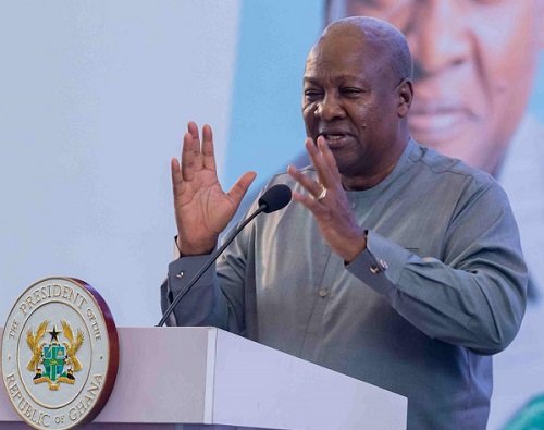 President Mahama (inset) addressing participants at the conference