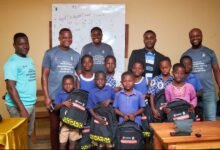 Pupils and officials of GLOMEF after the presentation