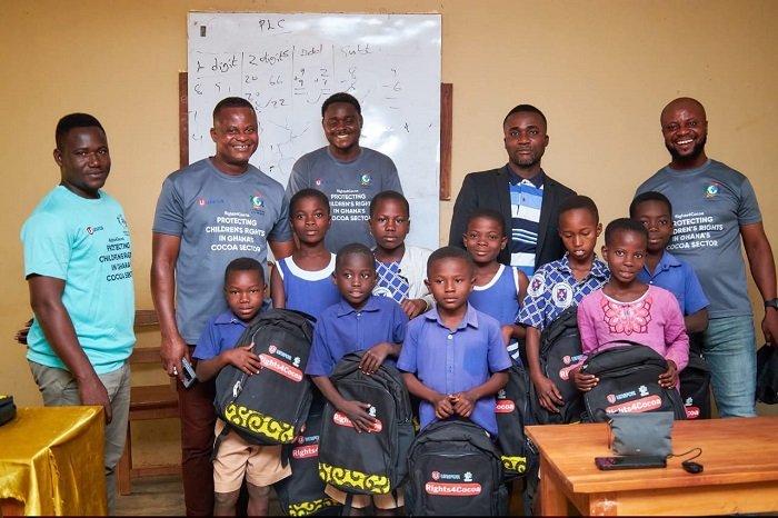 Pupils and officials of GLOMEF after the presentation