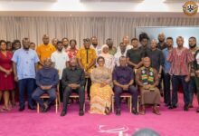 Mrs Marilyn Maame Efua Houadjeto (seated middle) with some leadership of the Authority and journalists