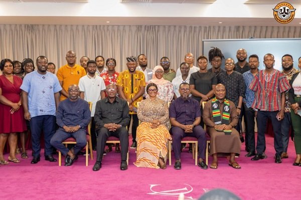 Mrs Marilyn Maame Efua Houadjeto (seated middle) with some leadership of the Authority and journalists