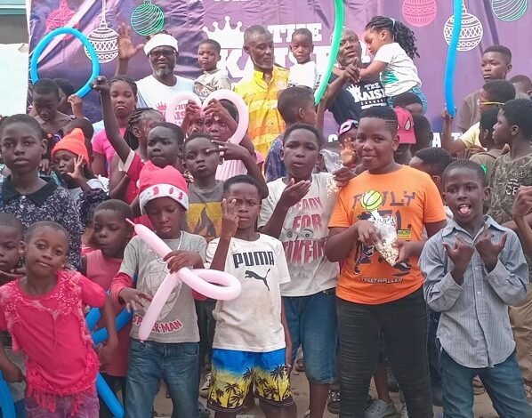 • Mr Mensah, with some of the children after the party