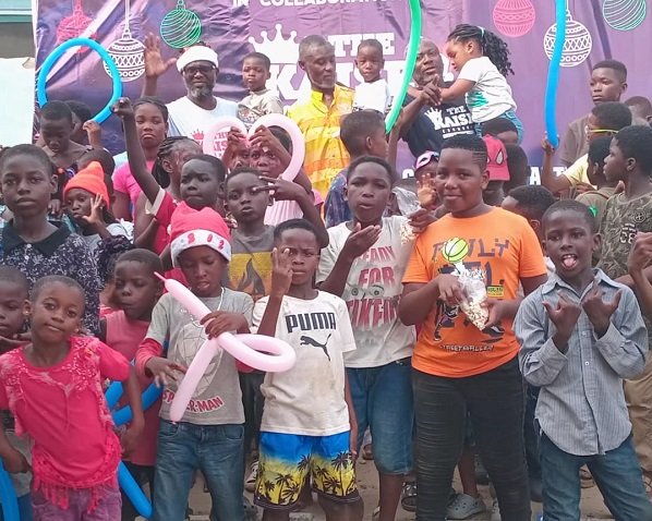 • Mr Mensah, with some of the children after the party