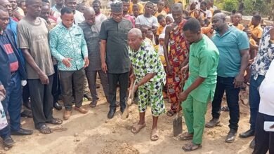 • Togbe Agbala Anthony cutting the sod for work to start. With them is Dr Sam Suraj Issah ( third from right ) and other dignitaries at the programme