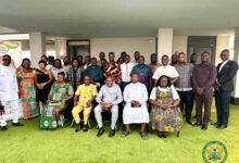 -Dr Pelpuo (seated middle) with other management of the ministry and journalists at the event