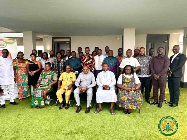 -Dr Pelpuo (seated middle) with other management of the ministry and journalists at the event