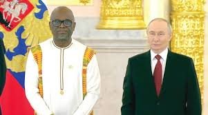 Dr DjewaAppiah with President Putin