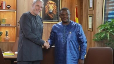 Mr Samuel Nartey George (left) and Mr Blewett exchanging pleasantries after the event