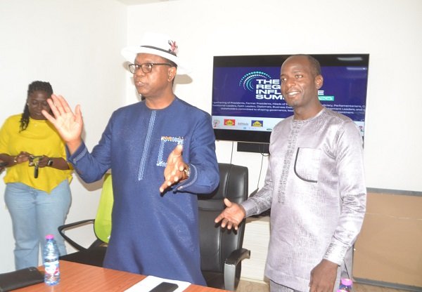 • Rev. Kennedy Okosun (left) speaking at the meeting. With him is Mr Rajaab Moses Photo: Victor A. Buxton