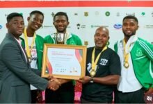 Members of the UDS team receiving the winners's citation