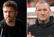Michael Carrick (left) with Steve Holland