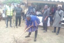 Mr Addison Dodzi Mornyuie breaking the ground for work to start on the six unit classroom block project