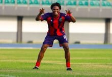 • Muna celebrating his second goal for Eleven Wonders