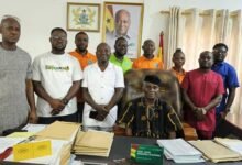 Mr Kwadwo Gyapong (sitting), Mr Emmanuel Ntoso (right) with other members of the association