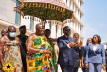 • Dr Asiama (middle) and Otumfuo Osei Tutu II touring the the bank facility