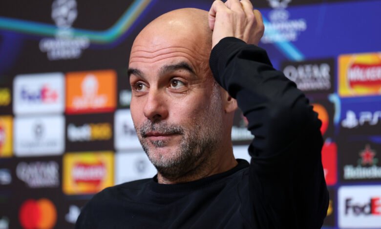 Pep Guardiola with Erling Haaland