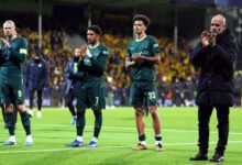 Pep Guardiola leads his players to acknowledge cheers from the City fans after the game