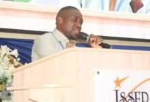 • Prof. Simon-Peter Kafui Aheto (inset) reading the communique at the New Year School and conference closing ceremony Photo: Ebo Goeman