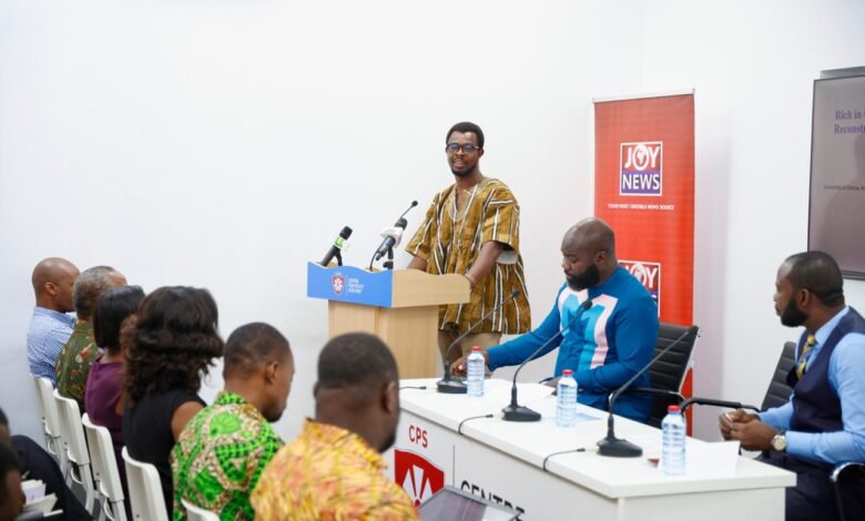 Professor Alagidede (standing) addressing the participants