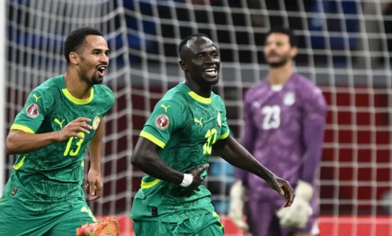 Sadio Mane joined by Iliman Ndiaye to celebrate his goal
