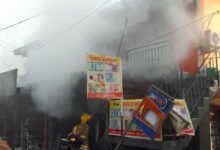 Fire men dousing the fire.