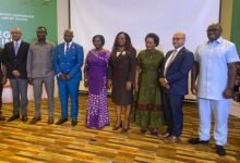 Professor Opoku-Agyemang (middle) with some stakeholders at the retreat