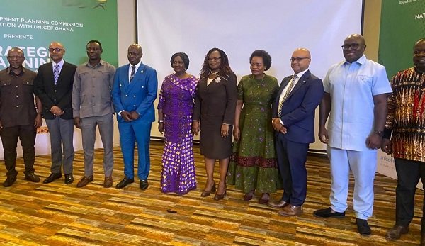 Professor Opoku-Agyemang (middle) with some stakeholders at the retreat